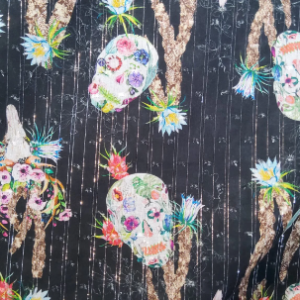Cotton poplin Skulls with flowers pattern on Black base