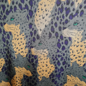 Silk viscose stretch fabric in Gray base with leopards