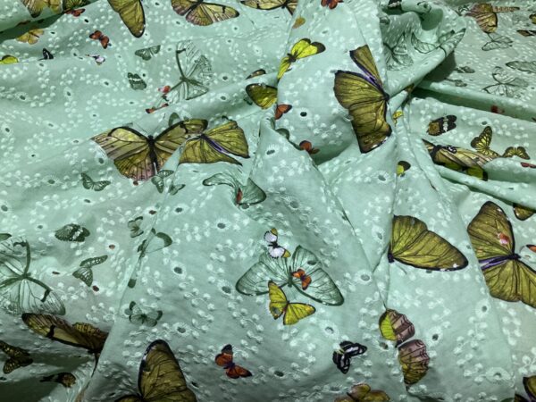 Wonderful Cotton poplin with embroidered eyelets and butterflies