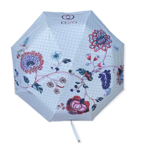 Designer G umbrella with a flowers
