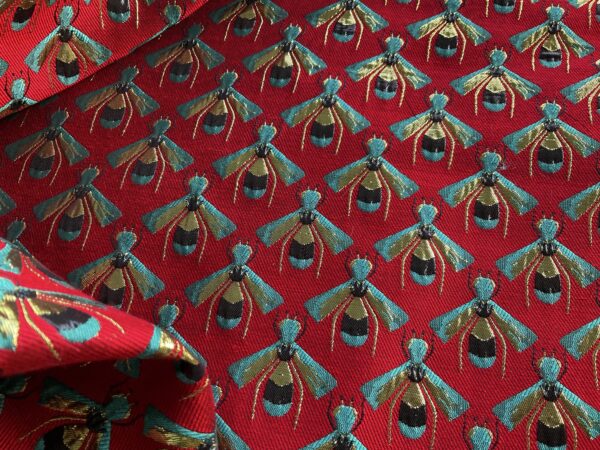 Gucci jacquard woven fabric with gold yarn and bees pattern